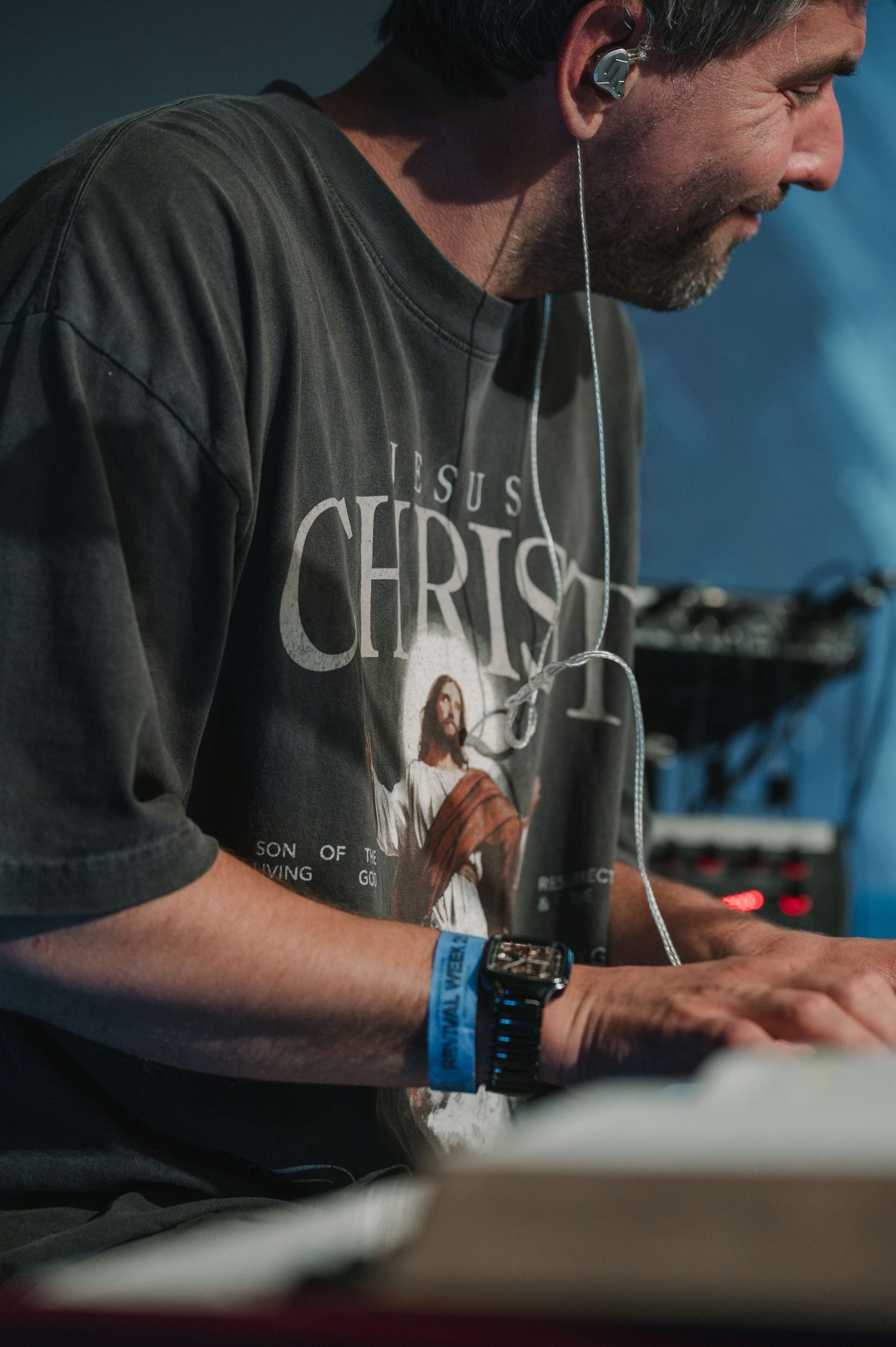 A musician at the keyboard during worship at Christian Centre